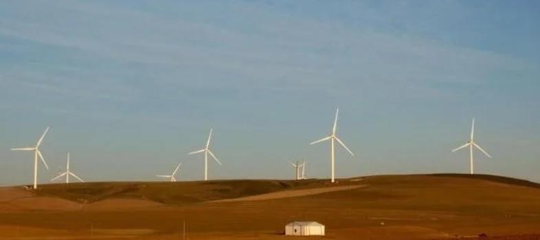 A wind turbine produces renewable energy outside Caledon, South Africa
